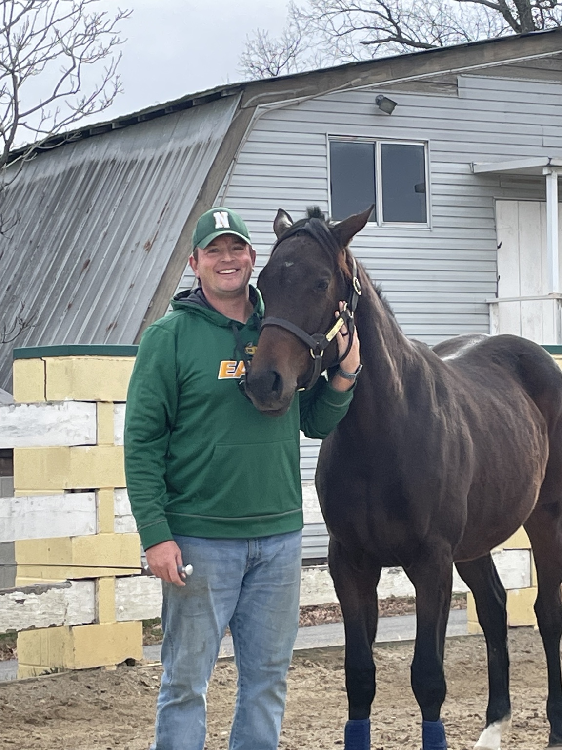 Adam standing with Daisy at Bannon Woods Farm