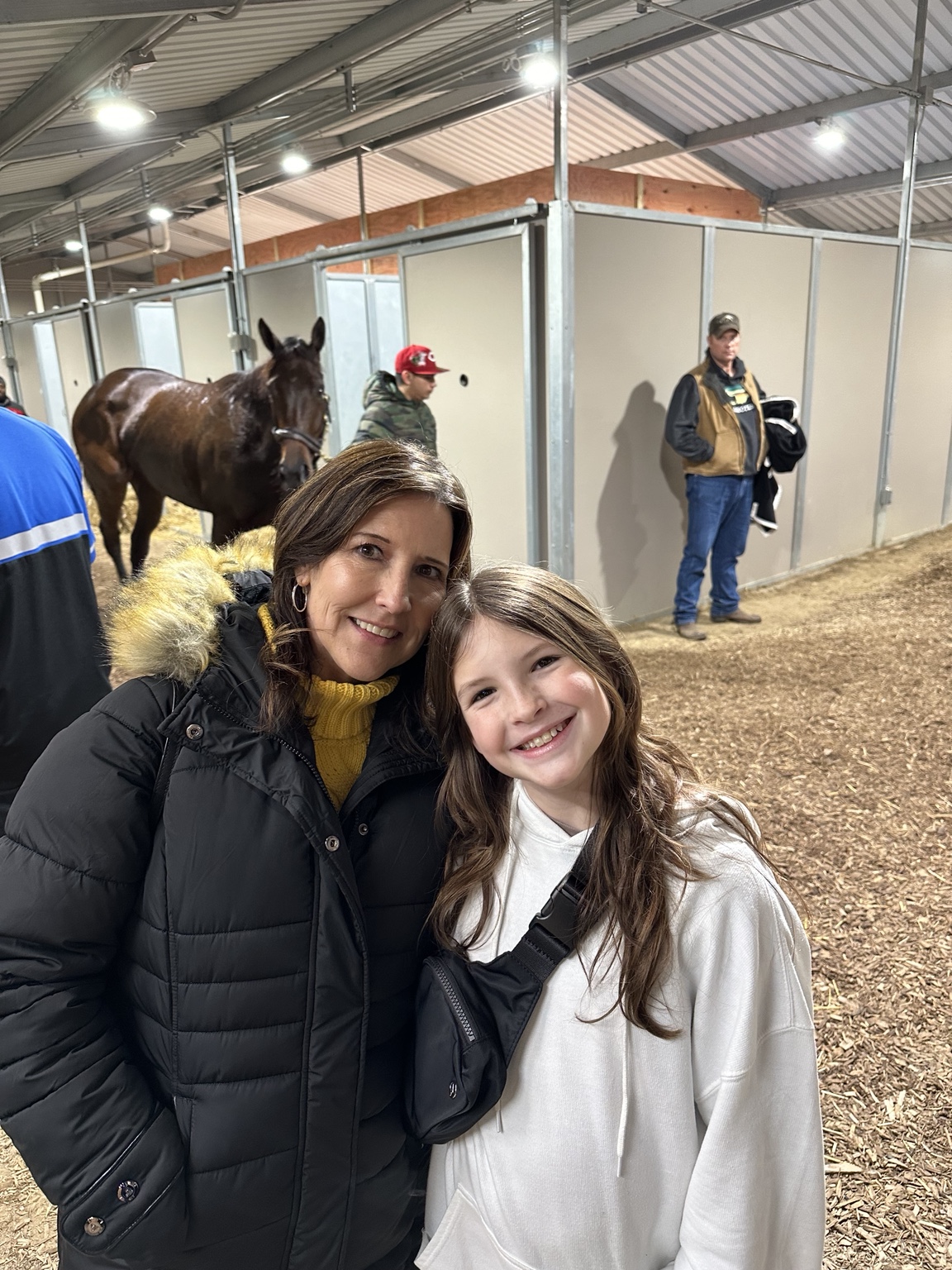 Shelby and Rachel smiling in the test barn after Daisy finished second