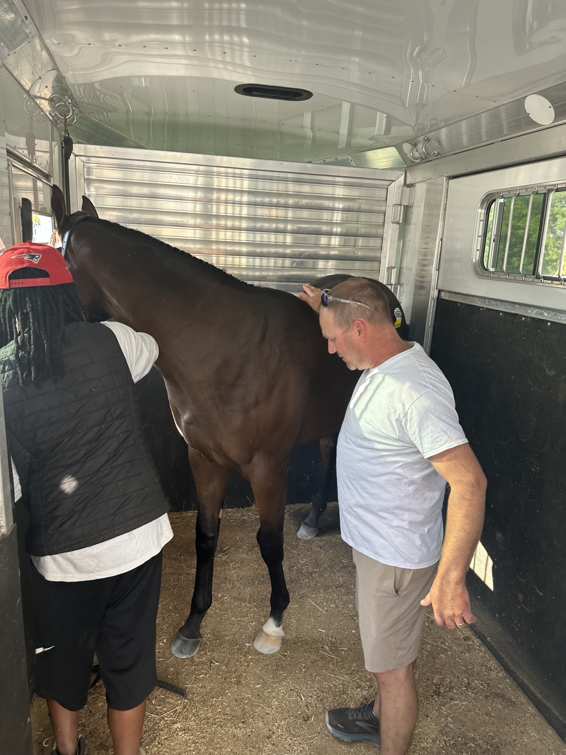Eric Foster with the colt as he is loaded into the trailer